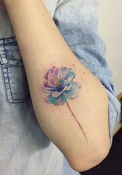 Tatuaż damski kwiaty